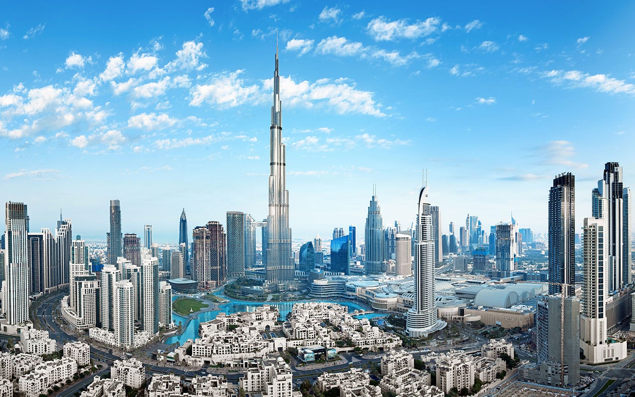 Overview of Business Bay, Dubai, highlighting key commercial real estate zones surrounded by impressive buildings and amenities.